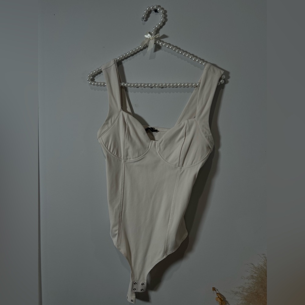 Women’s Bodysuit Cream. size M